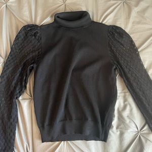 A black turtleneck